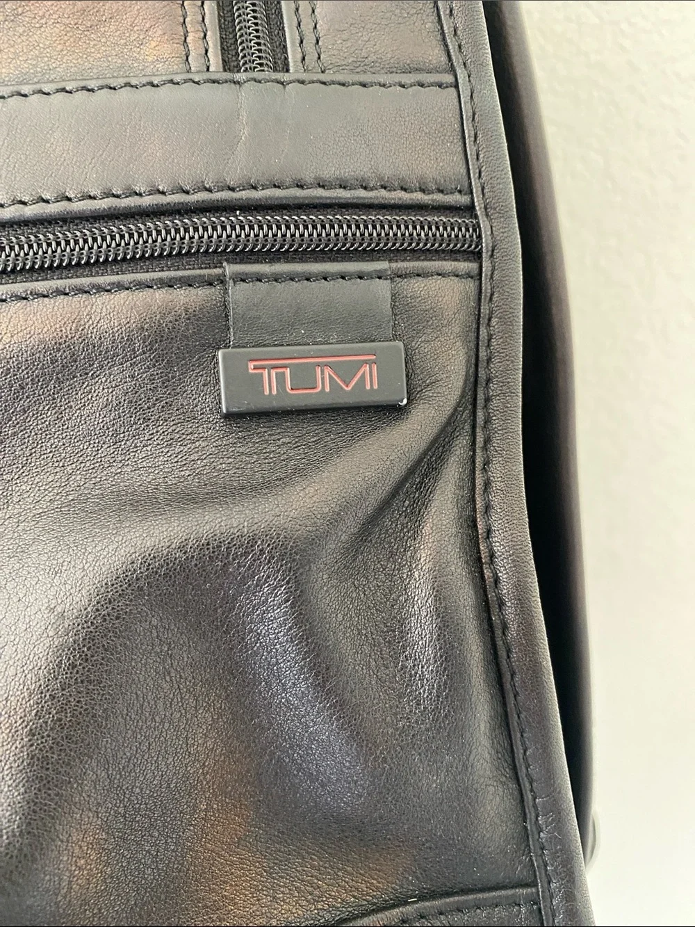 Tumi black men